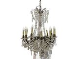 a chandelier that has five lights hanging from it