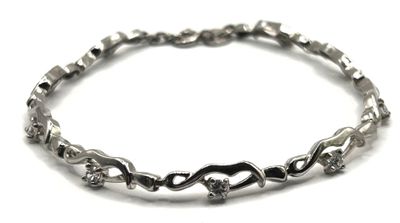 SAGA - Un bracelet en argent 925/1000 rhodié serti de 9 pierres blanch - Photo 1