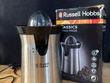 a box of russell hobbss juicers next to a juicer