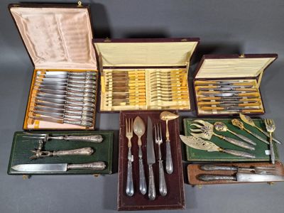 many different types of silverware in a case