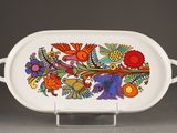 an image of a white serving dish with colorful flowers on it