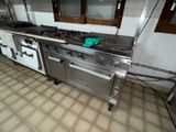an image of a kitchen with a stove and oven