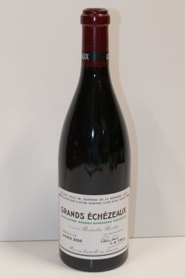 a bottle of wine that is sitting on a table
