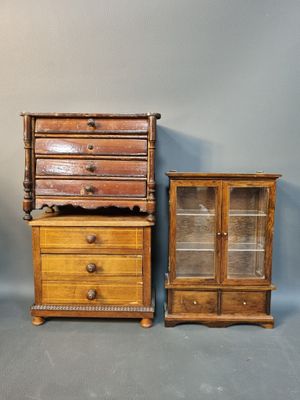 three pieces of furniture including a dresser, cabinet, and chair