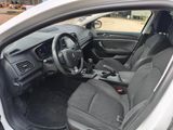 the interior of a car with the door open showing the steering wheel and dashboard