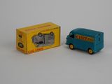 a blue toy truck and a yellow box on a white surface