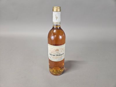 a bottle of wine that is sitting on a table