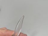 a person holding a pair of scissors in their hand