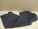 a pair of blue pants on a white table