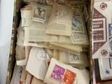a box full of mail sitting on a table