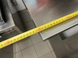 a measuring tape that is on top of a table