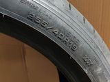 a close up of a tire with a box in the background