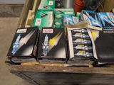 a lot of boxes of toothbrushes on a table