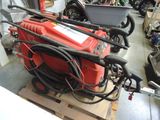 a lot of tools that are on a pallet in a garage