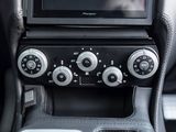 an image of a car dashboard with a tv in the center