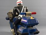 a man riding a motorcycle with a helmet on