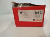 a red box with a label on it sitting on a table