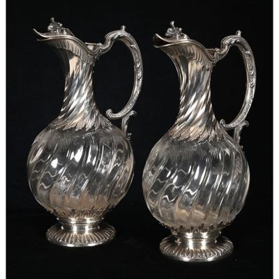 a pair of antique silver plated glass vases on stands