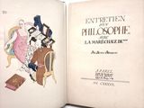 a book with a picture of a woman sitting on a chair