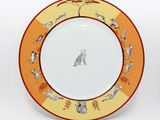 a plate with a picture of a bird on it