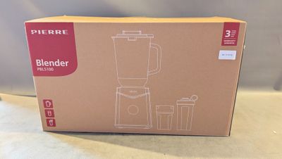 a box with a blender inside of it on a table