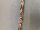 an image of a close up of a piece of cloth on a stick