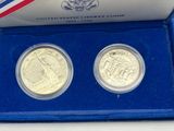 the two coins are in a blue box on the table