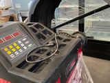 a machine that is sitting on a pallet in a warehouse
