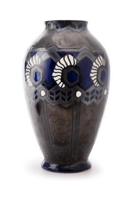 a black vase with a blue and white design on it