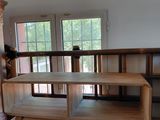 a room with a bookcase and a tv in it