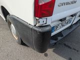 a white truck that is parked in a parking lot
