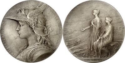 two silver medallions depicting a woman and a man