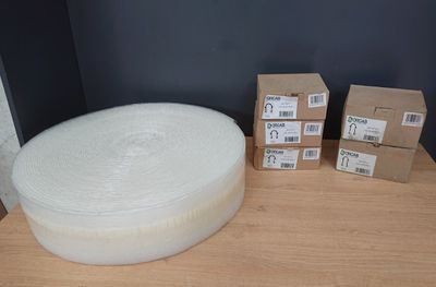 a large white bowl sitting on top of a wooden table