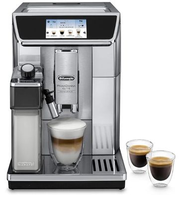 a close up of a coffee machine with two cups of coffee