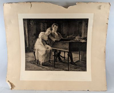 an old photo of a woman sitting at a desk with a dog