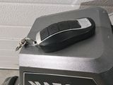 a remote control sitting on the back of a motorcycle