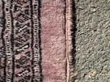 a close up of a rug on the ground