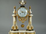 a clock that is sitting on top of a table