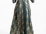 a green and gold dress on a mannequin mannequin mannequin mannequin mannequin mannequin mannequin mannequin mann