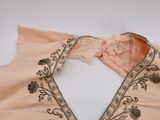an image of a piece of clothing that has been altered to look like it has been worn