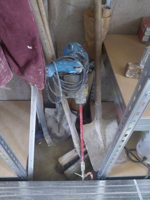 a picture of a room with a ladder and tools