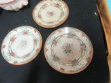 three plates that are sitting on top of a table