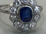 an image of a sapphire and diamond ring