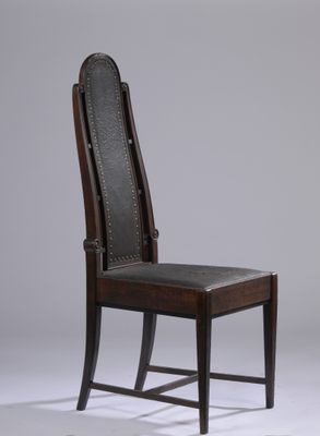 leather upholstered side chair with nail - tipped backrest