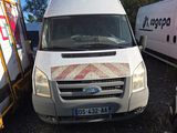 a white van that is parked next to a white van