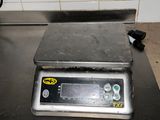 an image of a digital scale on a kitchen counter