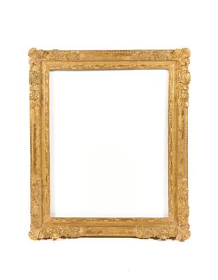 an antique gold frame with a white background