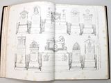 an open book with a drawing of a bunch of tombstones on it