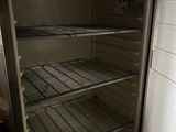 an open refrigerator that is sitting inside of a room
