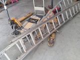 a pile of metal items that is sitting on the floor